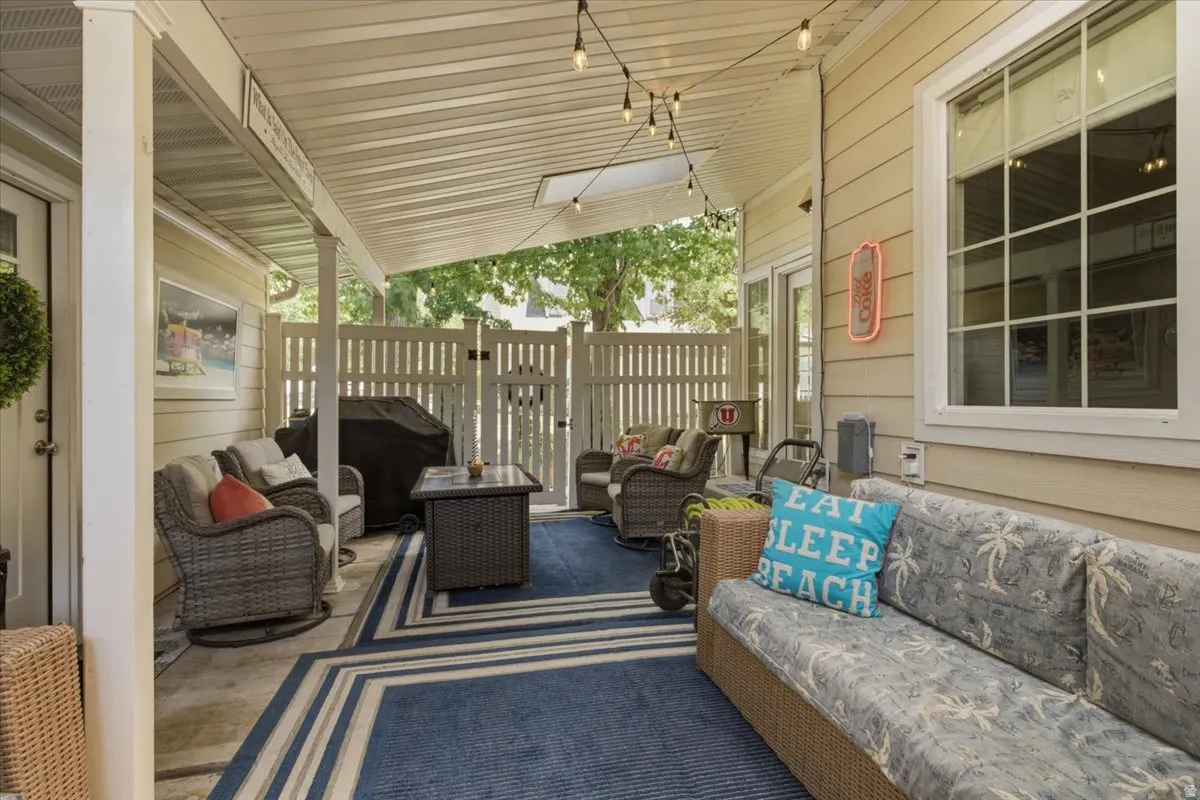 Covered patio with a skylight and concrete flooring