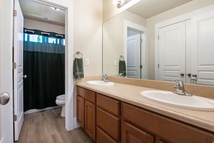 Dual vanity featuring integrated sinks and a continuous countertop