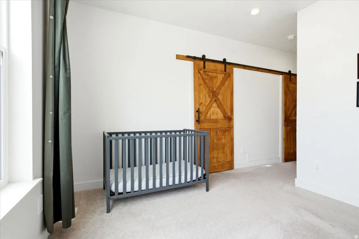 Hardwood barn doors with black hardware