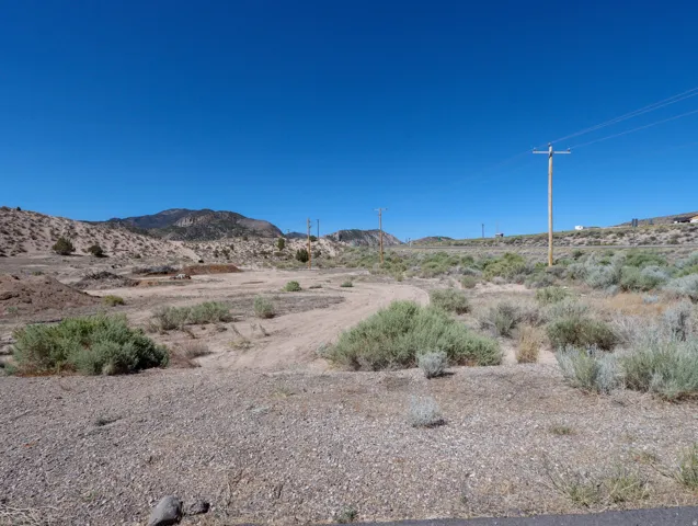 Expansive undeveloped land featuring natural desert vegetation