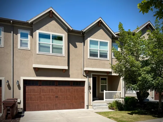 Stucco exterior with gabled roof lines