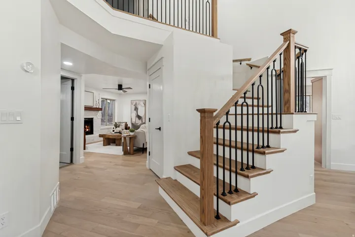 Light wood-finish flooring throughout the space