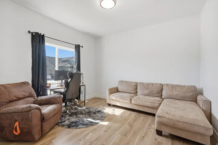 Light wood-finish flooring provides a neutral foundation for this room