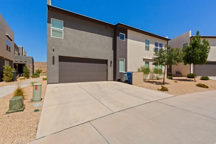 Modern two-story residence with a two-tone stucco exterior