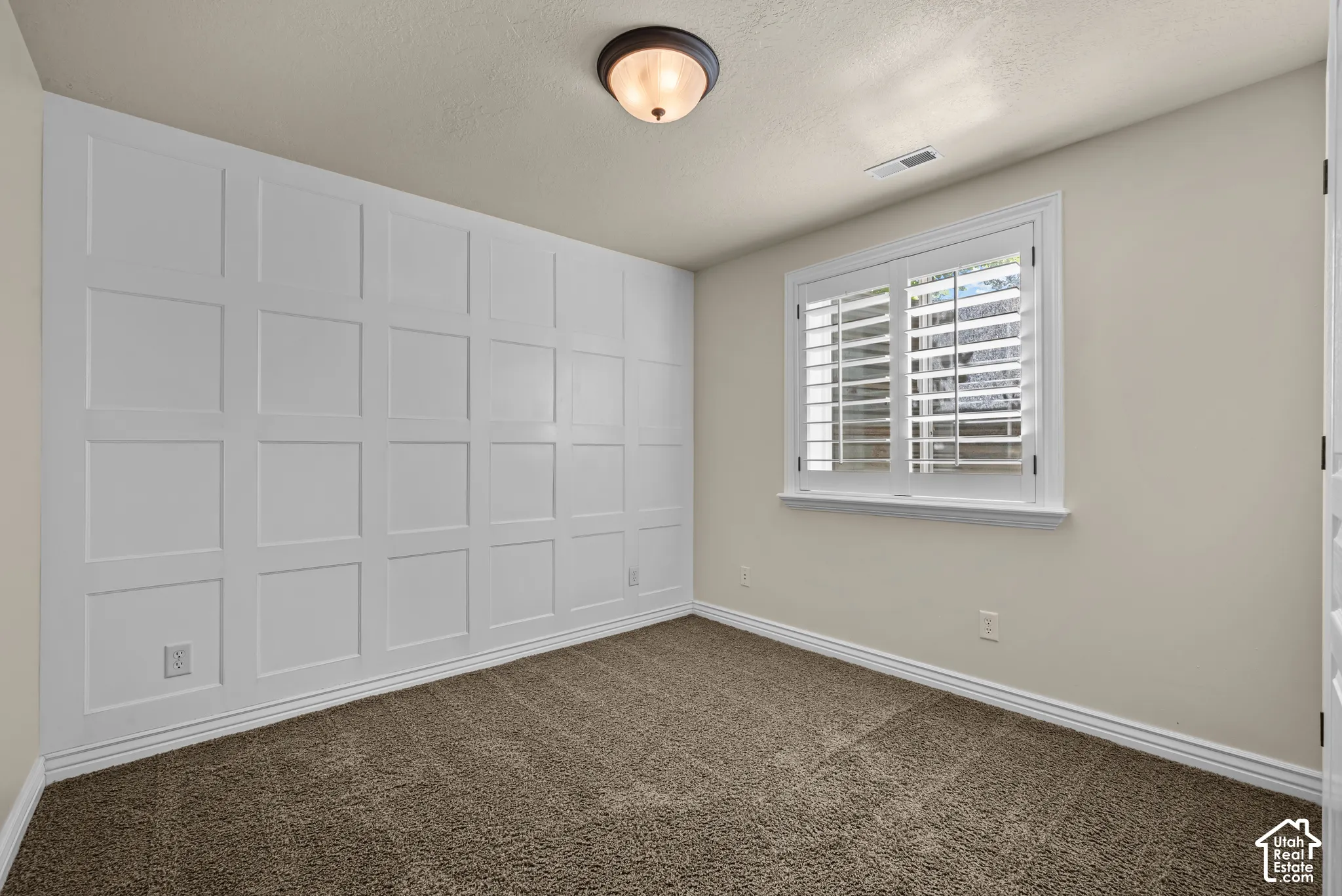Basement bedroom 3 - with decorative wall treatment
