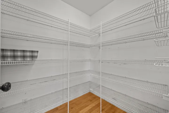 Corner pantry with wire organizing shelves