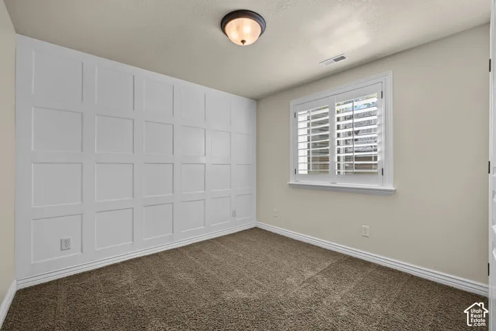 Basement bedroom 3 - with decorative wall treatment