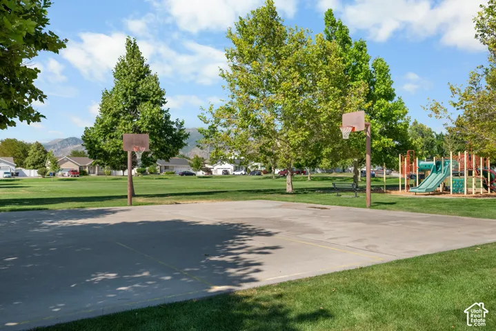 Concrete basketball court with dual hoops