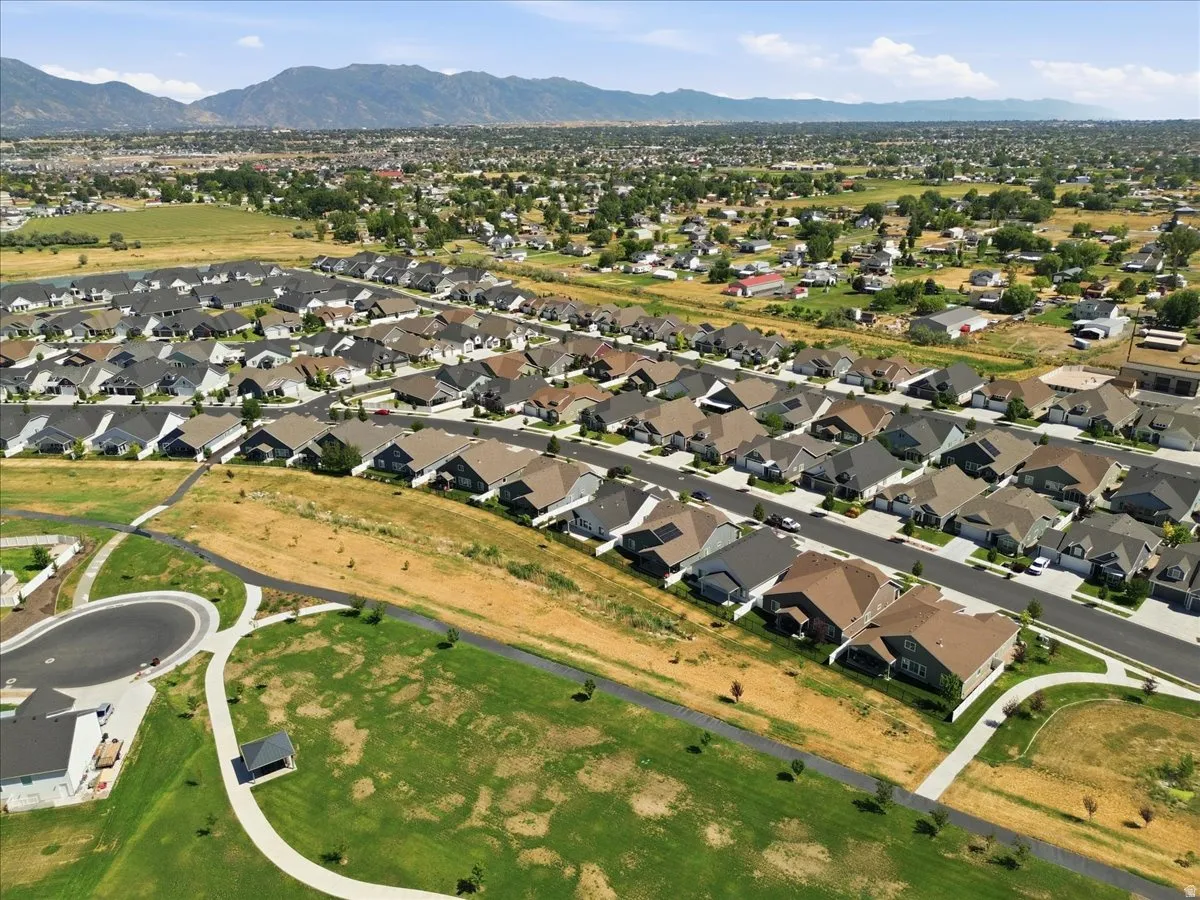 Expansive neighborhood featuring numerous residential properties with diverse rooflines and landscaping