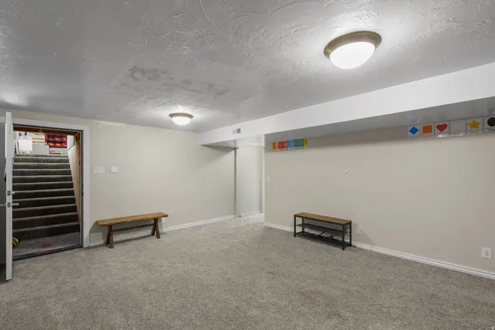 Walkout basement leading to garage.