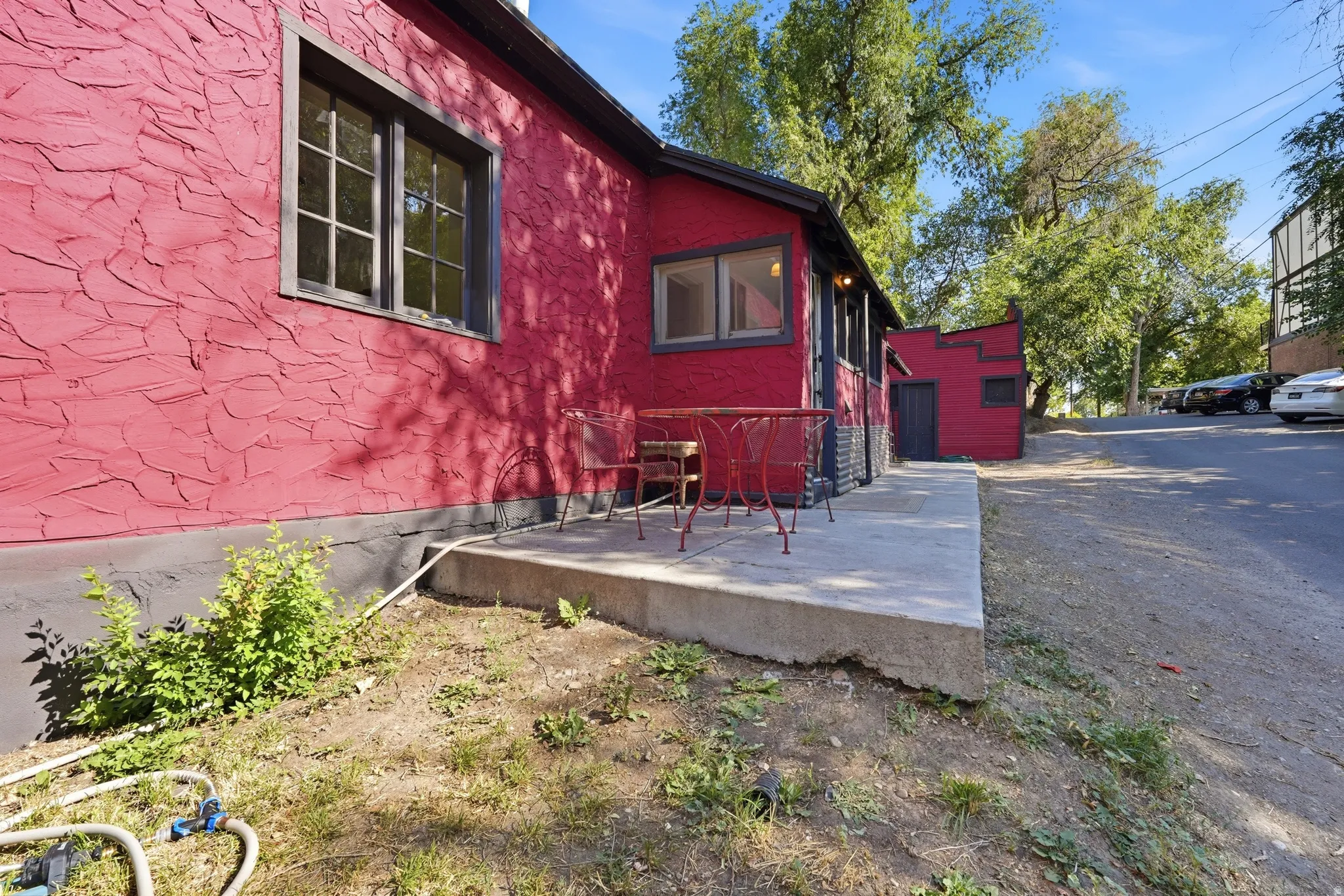 Red textured exterior with black trim windows