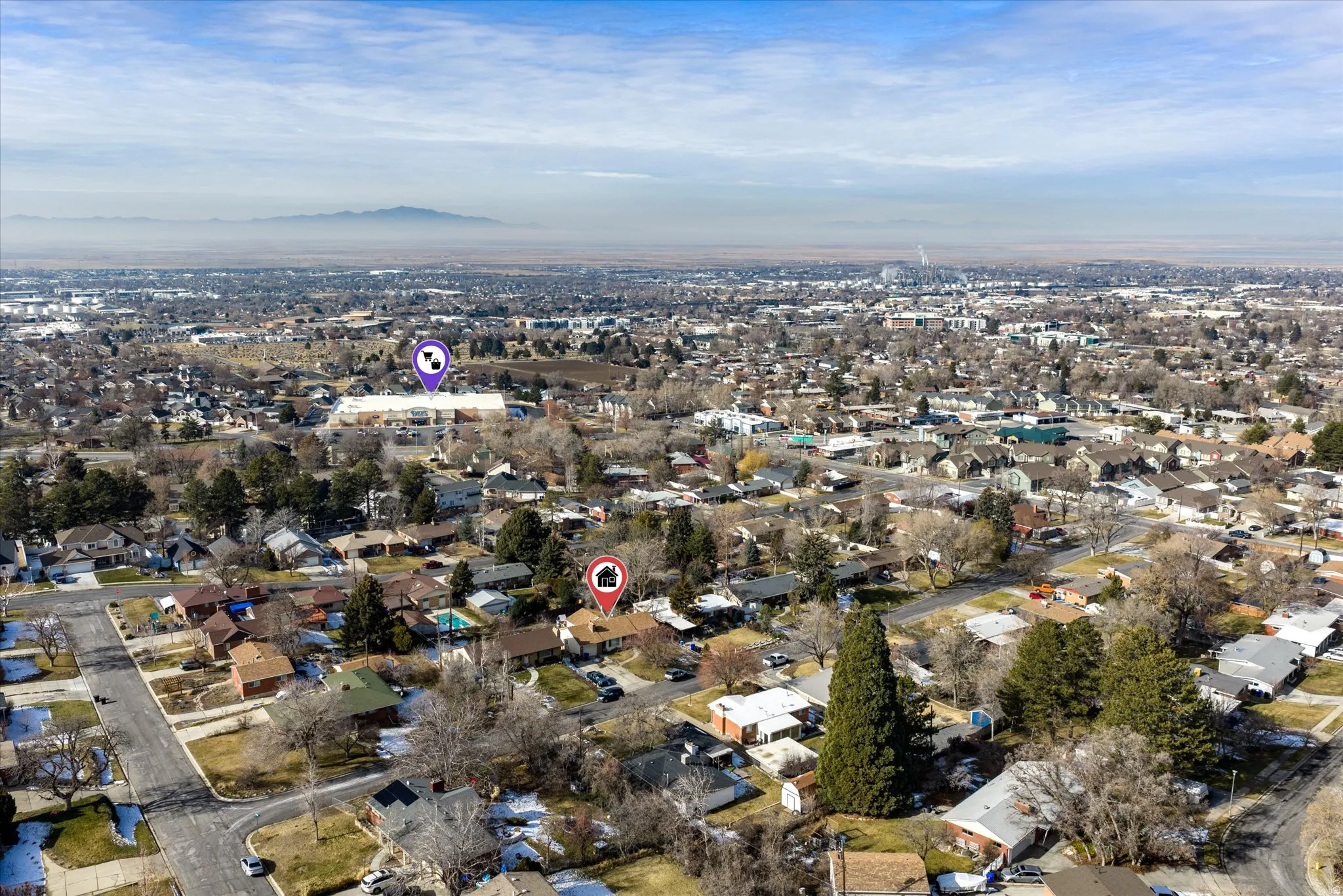 Aerial perspective showcasing a residential neighborhood with varied housing styles