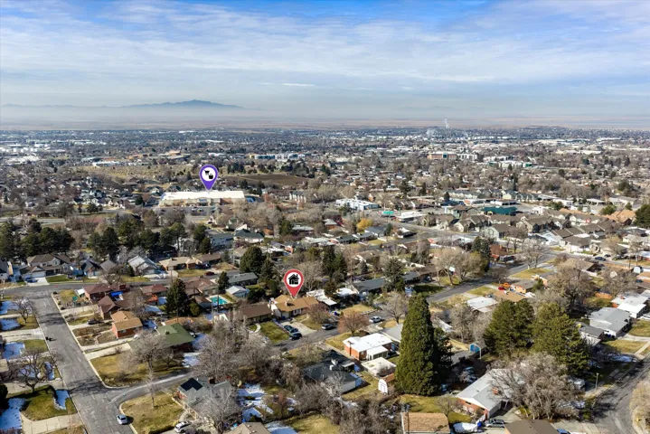 Aerial perspective showcasing a residential neighborhood with varied housing styles