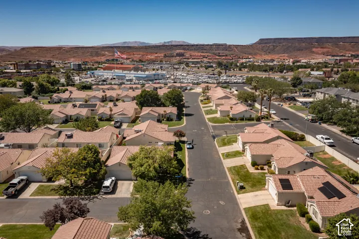 Residential community featuring uniform rooflines and mature landscaping