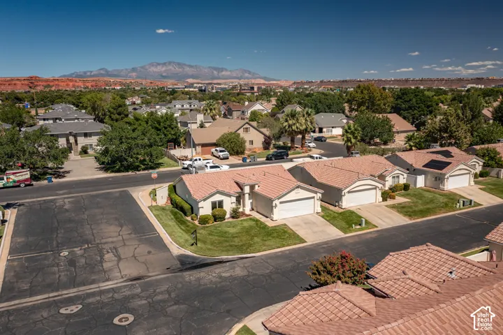 Neighborhood featuring single-story residences with attached garages and tile roofing