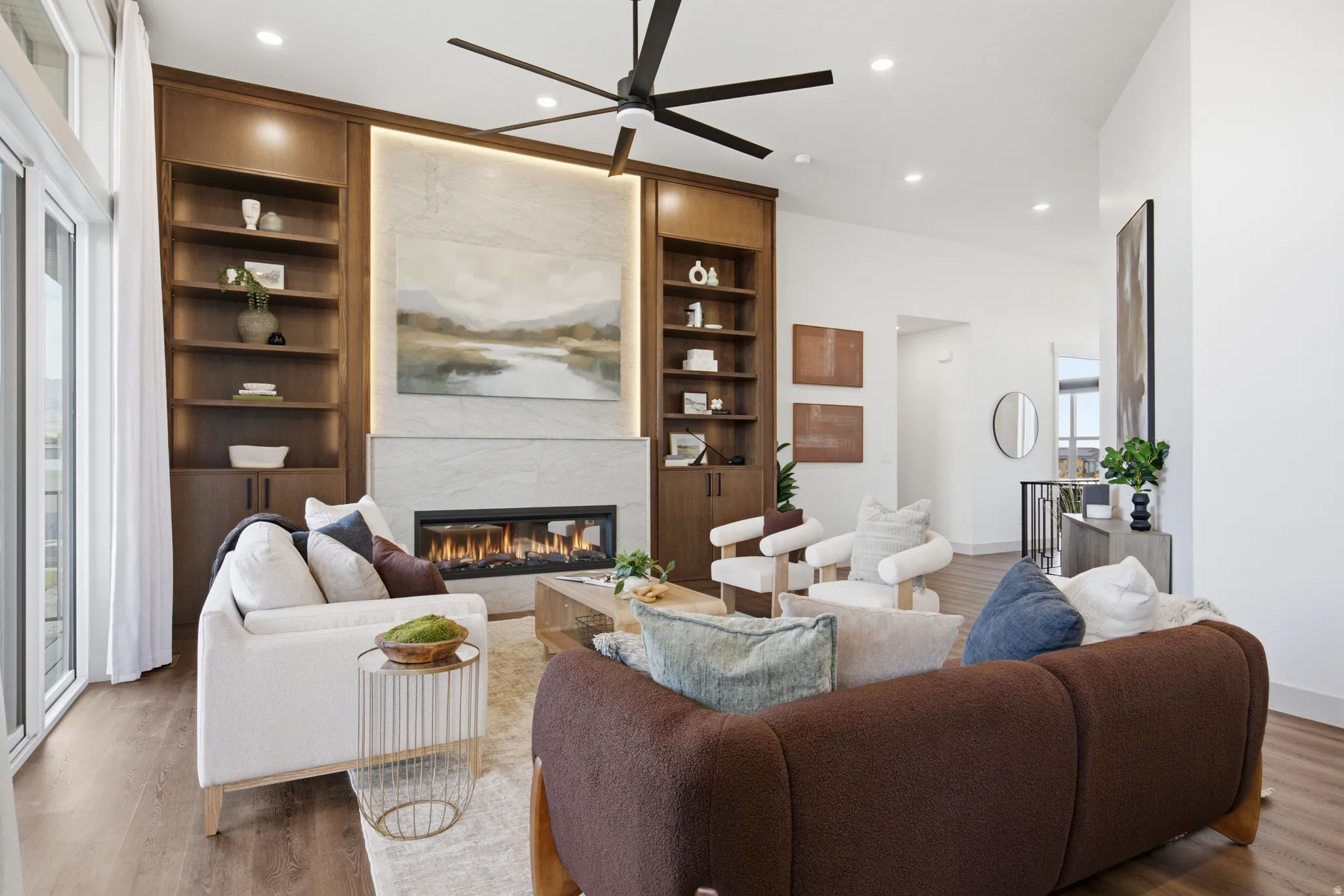 Living area with a vaulted ceiling and dark wood-finish flooring
