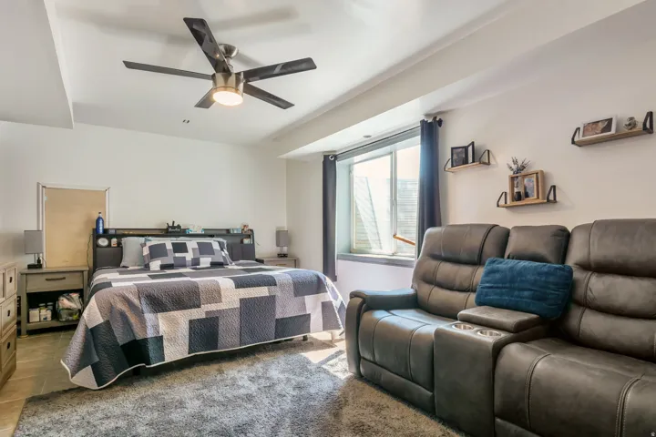 Recessed lighting with a ceiling fan overhead