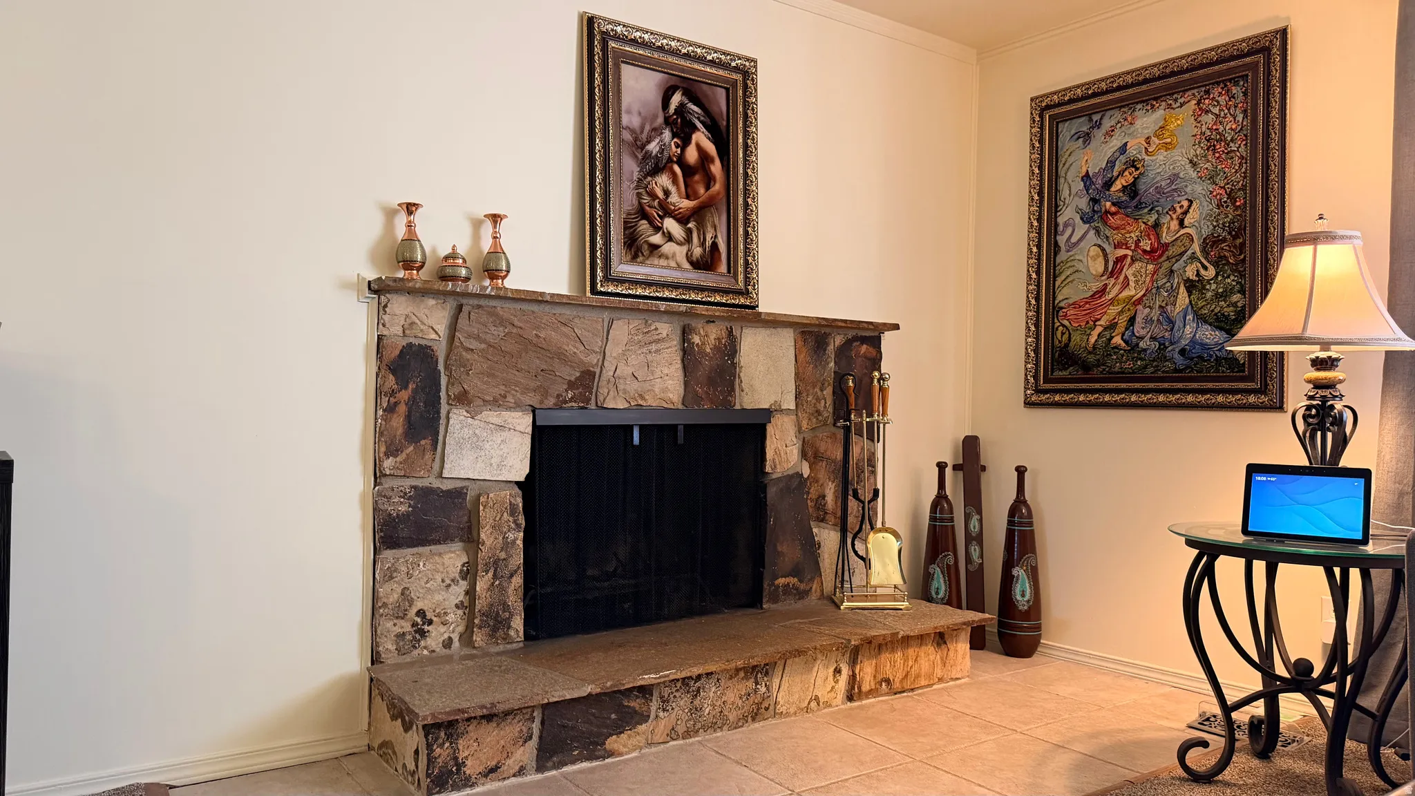 Stone-clad fireplace with a recessed firebox and stone hearth
