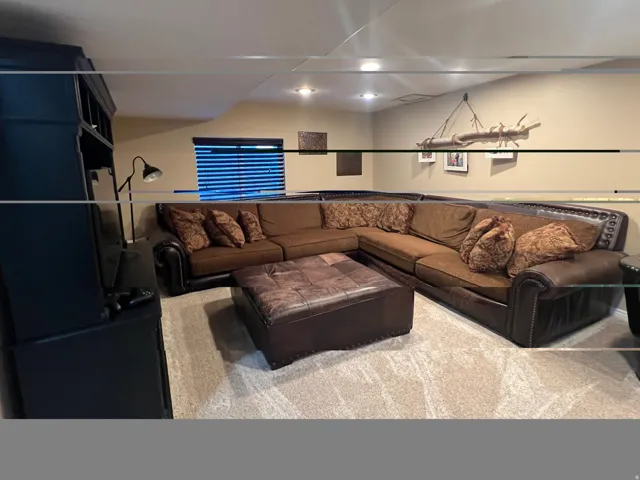 Carpeted recreation area featuring recessed lighting