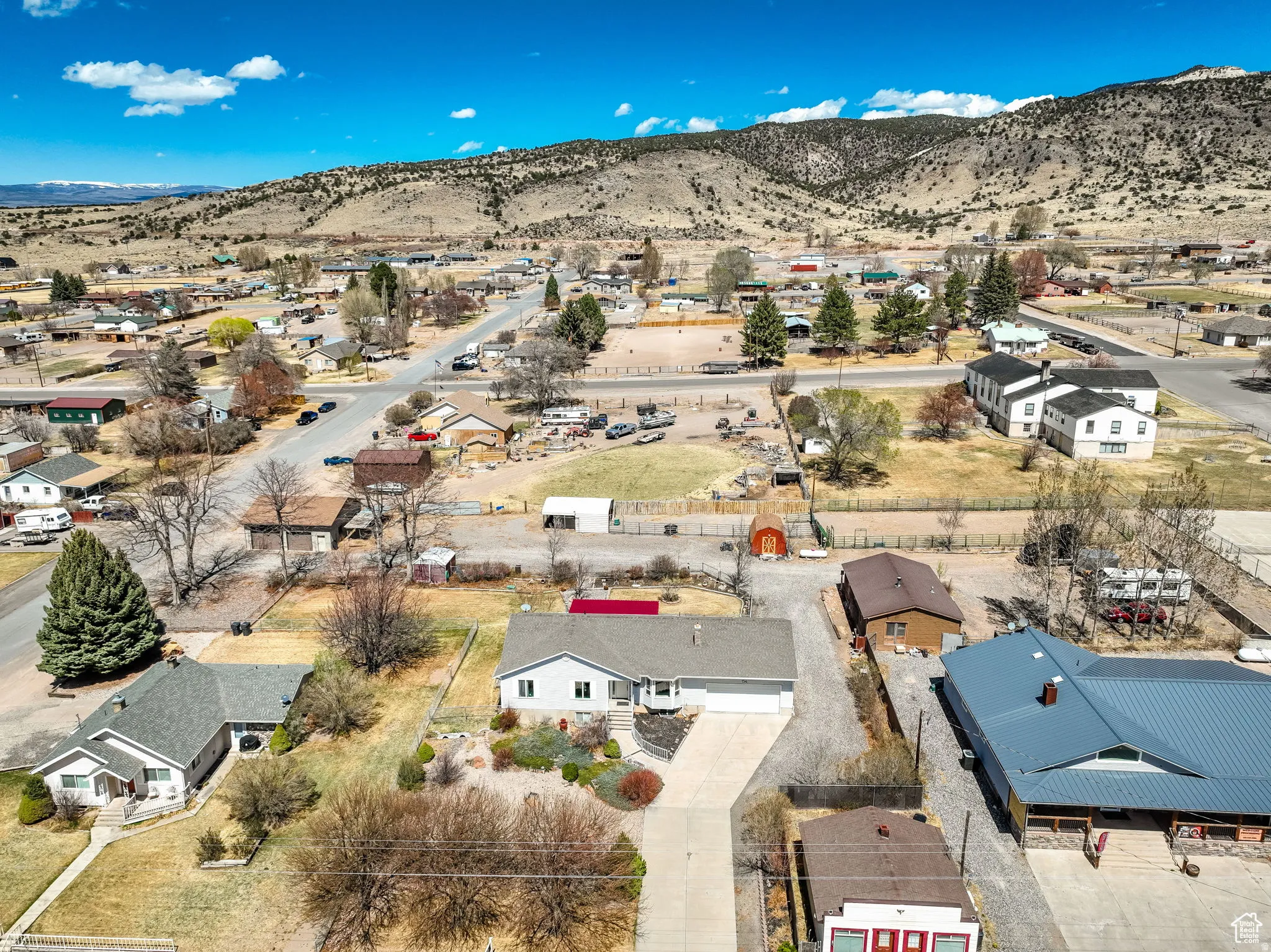 Single-story residence with an attached garage and a paved driveway