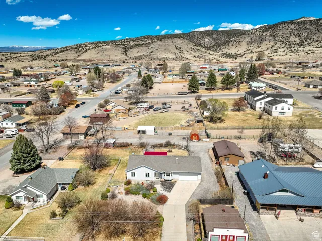 Single-story residence with an attached garage and a paved driveway