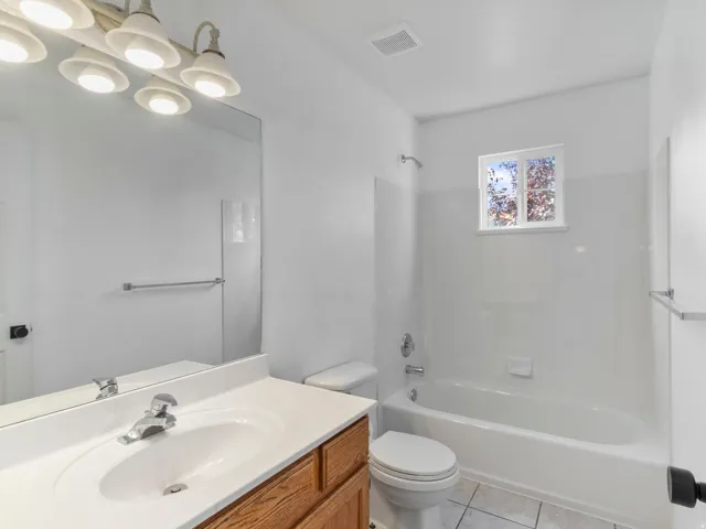 Full vanity mirror with overhead vanity lighting