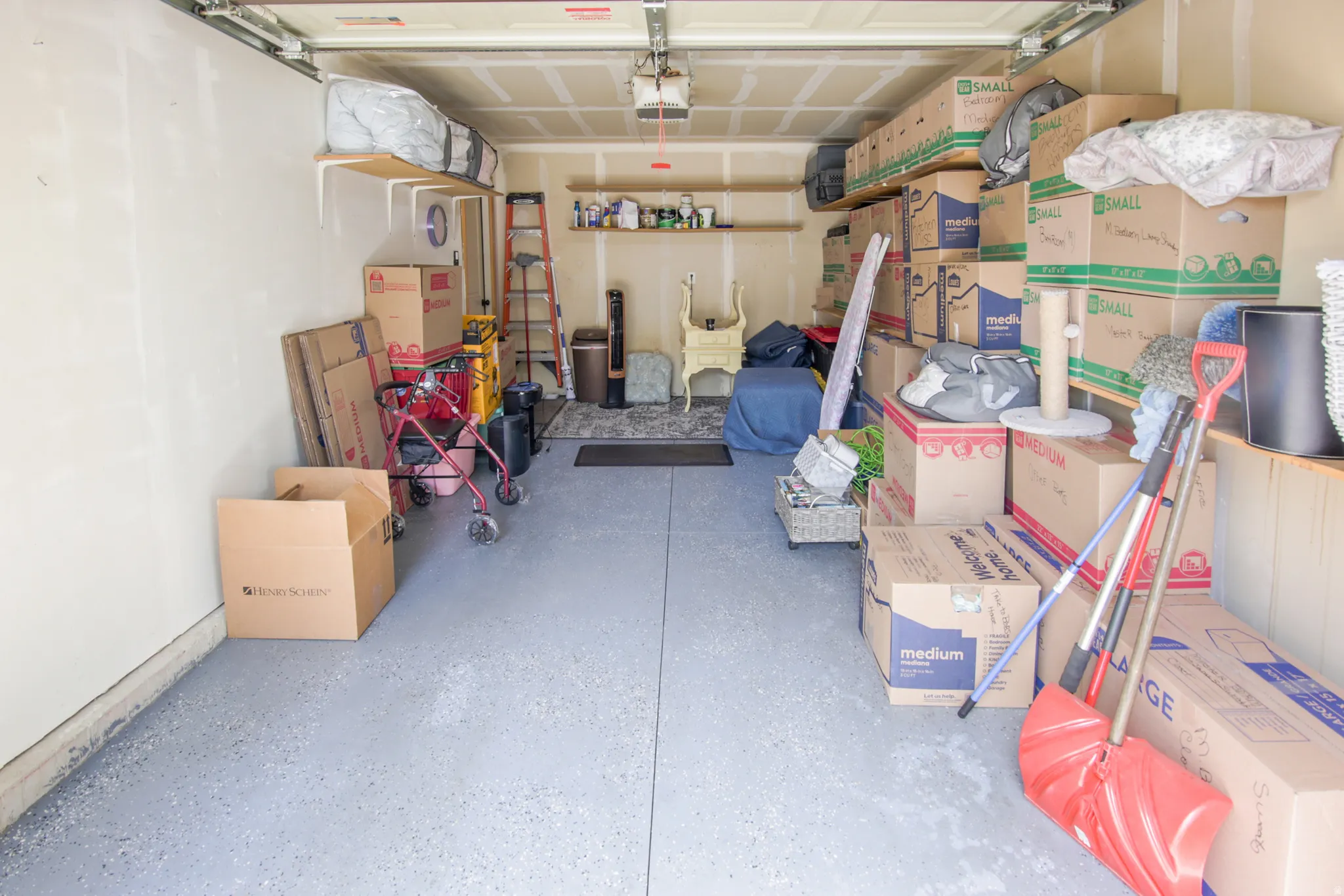 Garage space featuring durable epoxy flooring