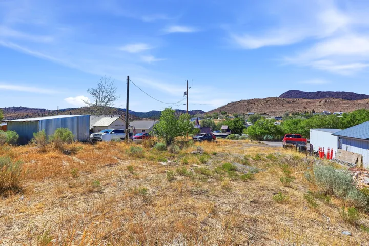 Expansive undeveloped lot featuring natural desert landscaping