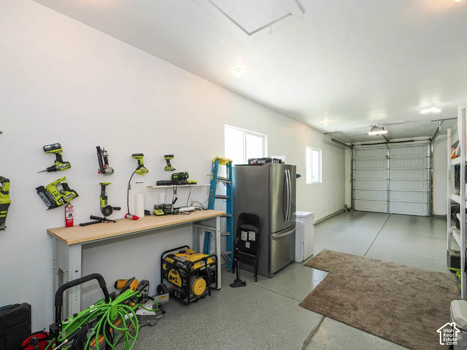 Epoxy floor in all 4 garages. Garage door for garages 3 and 4 is 9.5 feet tall