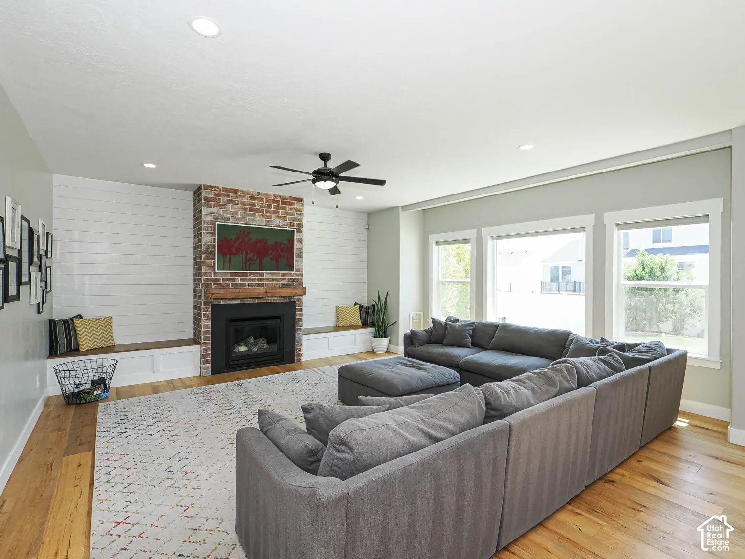 Open great room with fireplace & TV connections. Storage for electronic components  behind the TV