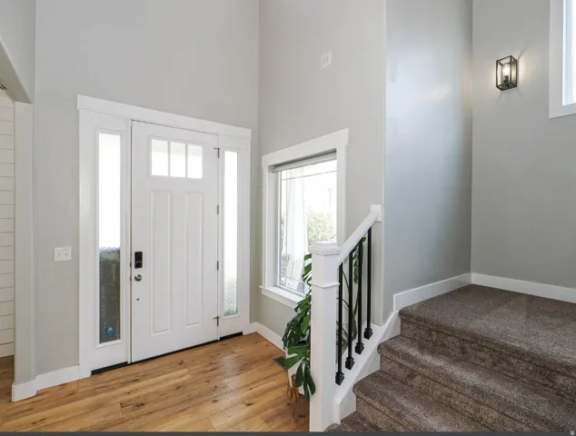 Welcoming entry with engineered hardwood throughout the main level