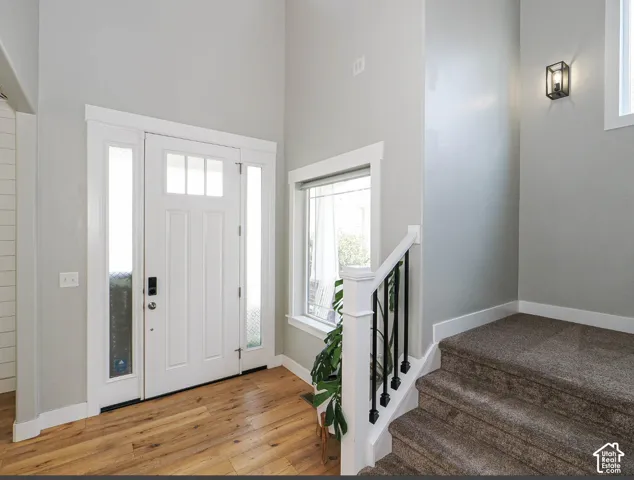 Welcoming entry with engineered hardwood throughout the main level