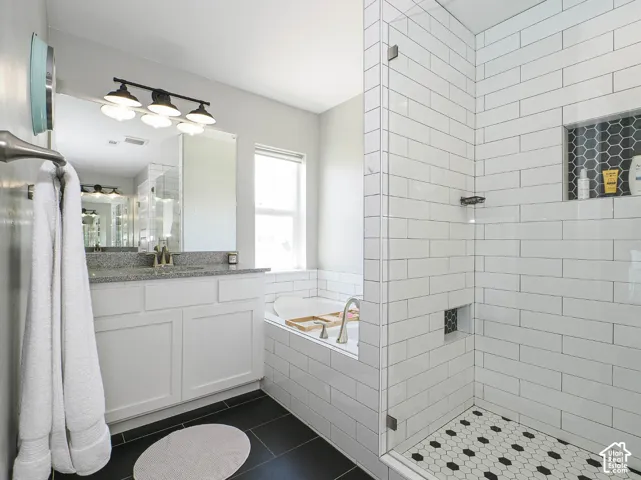 Soaking tub next to the walk in shower