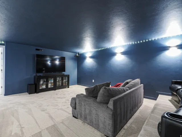 Tiered seating in the large theater room located under the garage