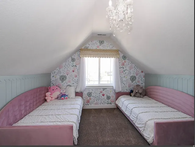 Bedroom #4 tucked under the eaves for a cozy room