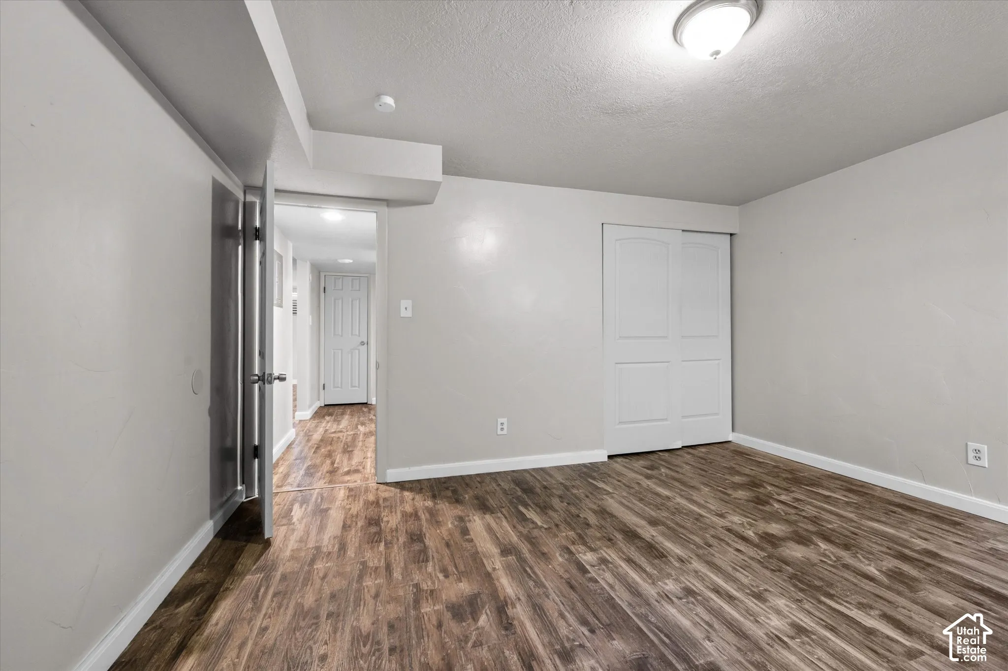 Wood-finish flooring throughout, offering a durable surface