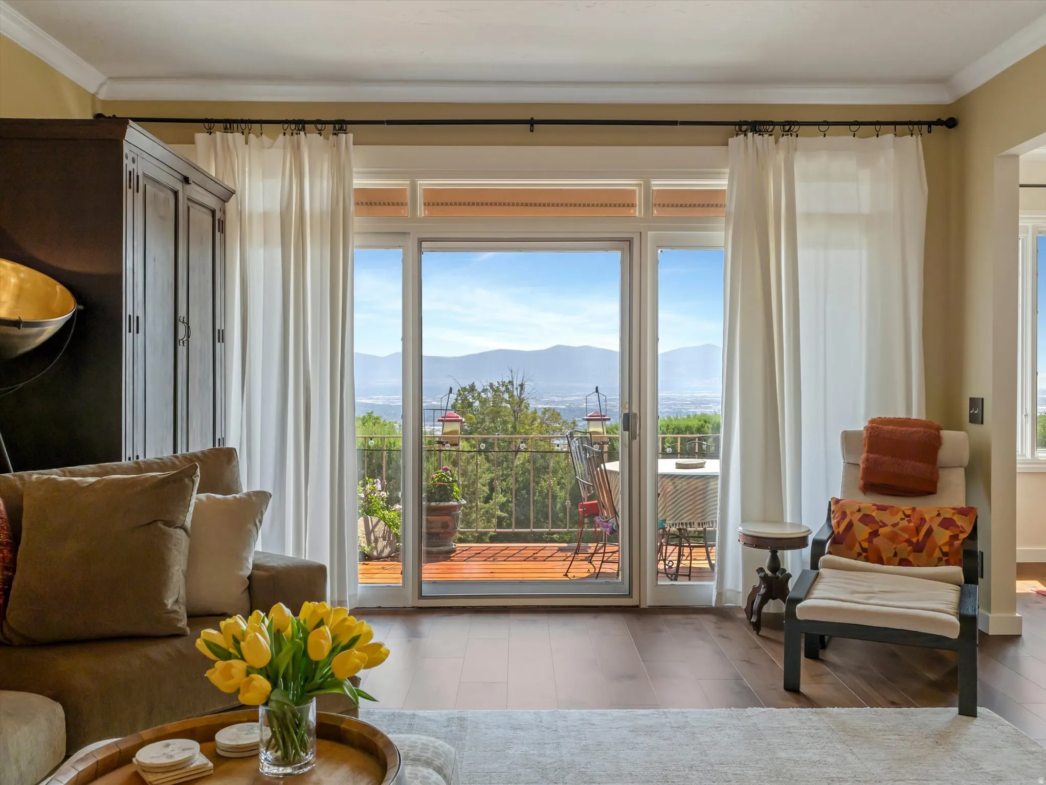 Expansive glass sliding doors with mountain scenery