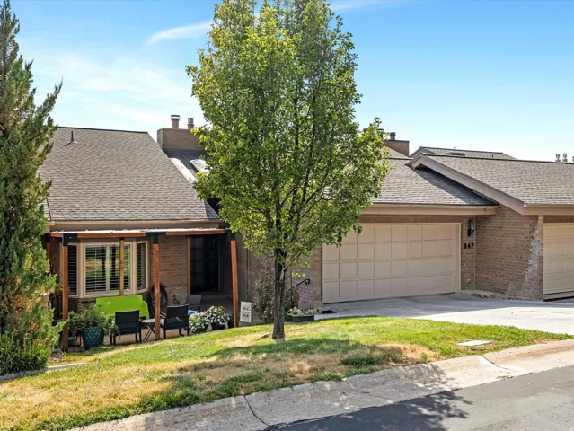 Brick exterior with a prominent two-car garage