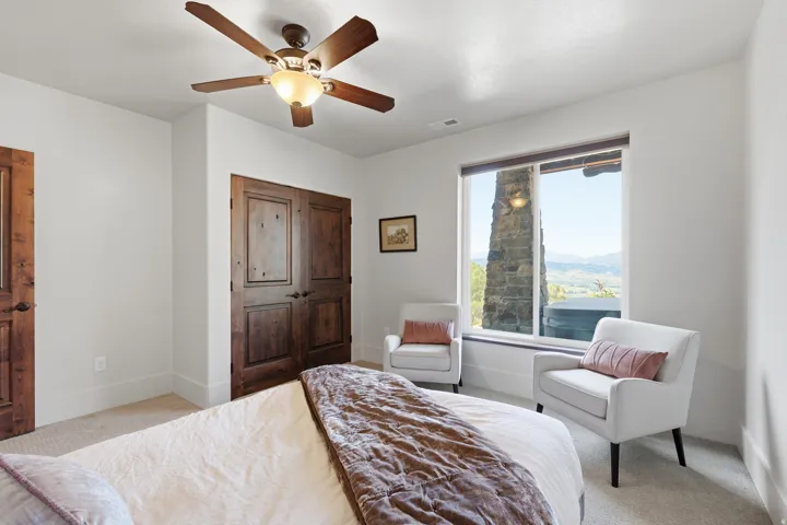 Expansive window offering distant mountain scenery