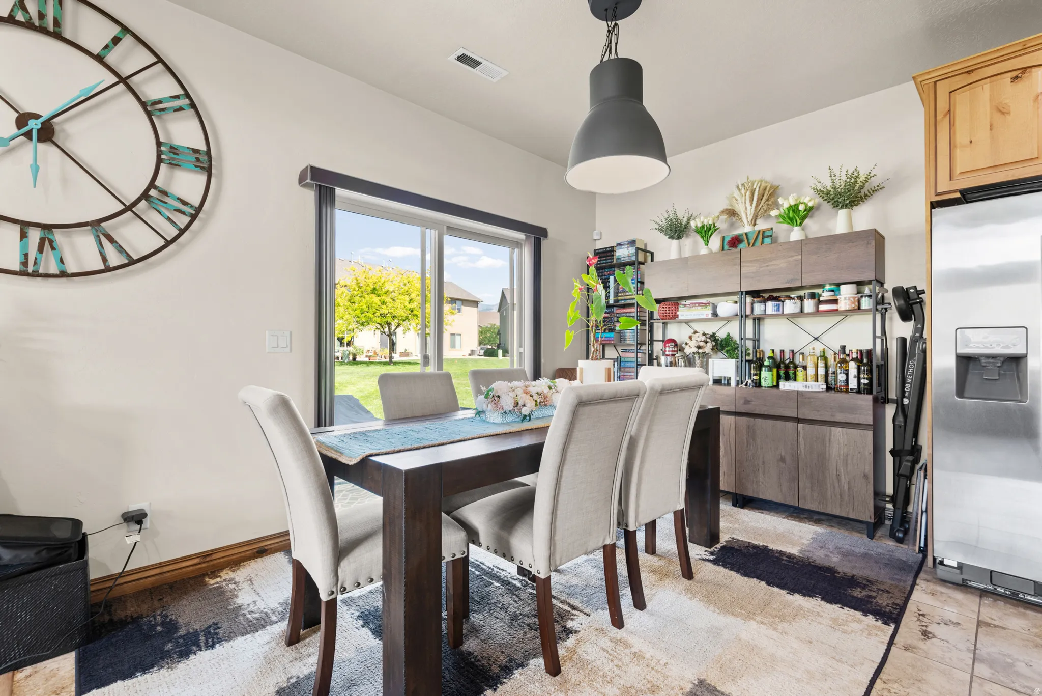 Sliding glass door opens to the backyard