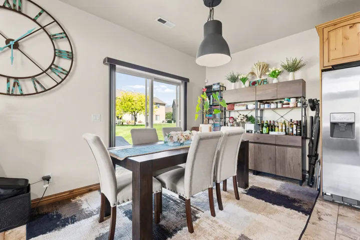Sliding glass door opens to the backyard