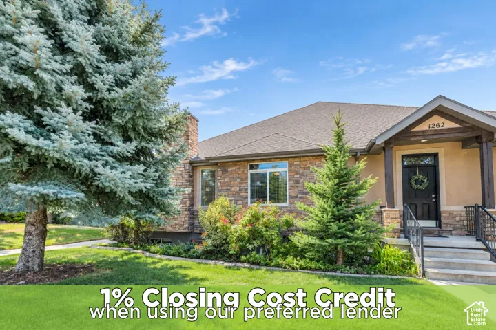 Exterior featuring stone veneer siding, covered entryway with wooden support beams, concrete stairs with metal handrails, and mature evergreen landscaping