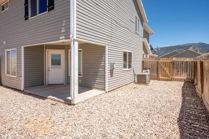 Covered patio with a concrete slab and direct access to the interior