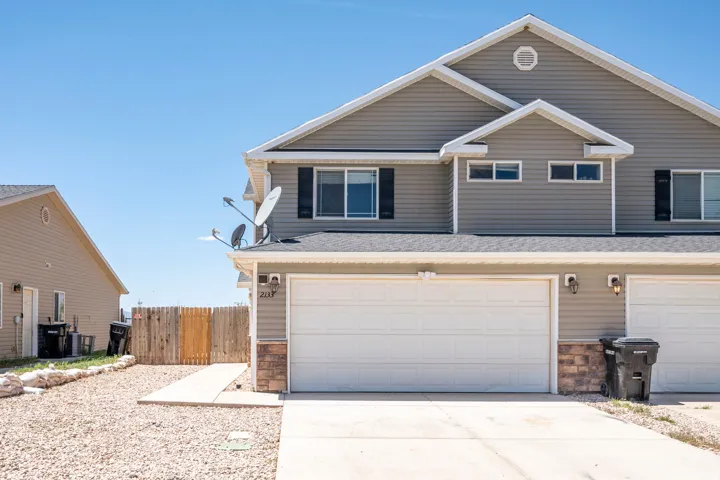 Gray siding exterior with white trim