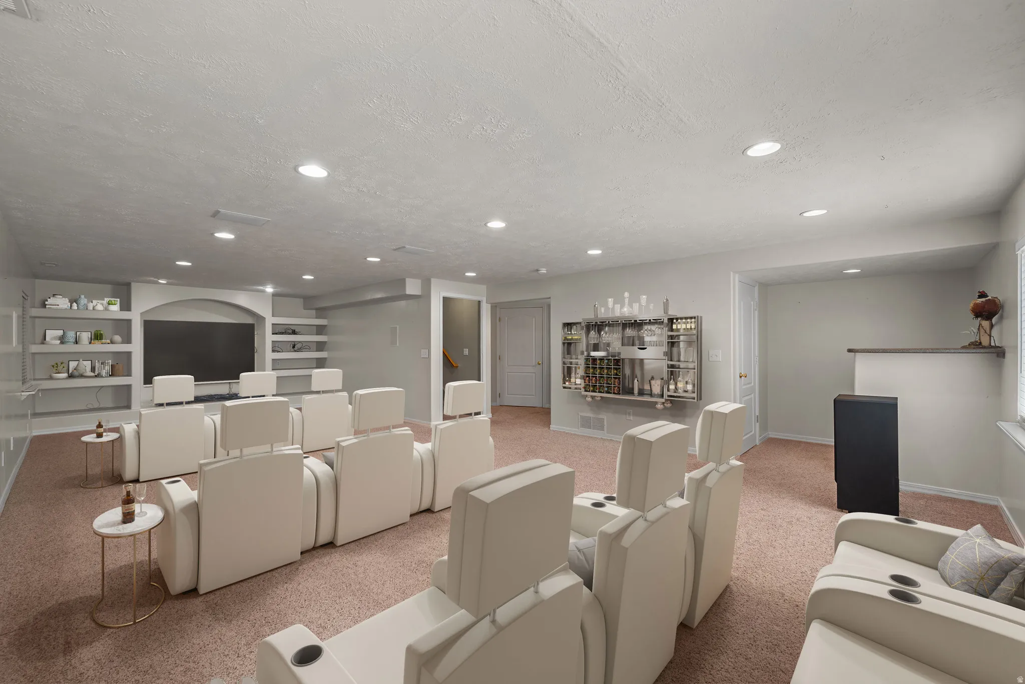 Integrated media wall with built-in shelving, recessed lighting, and a dedicated bar area with a built-in display cabinet