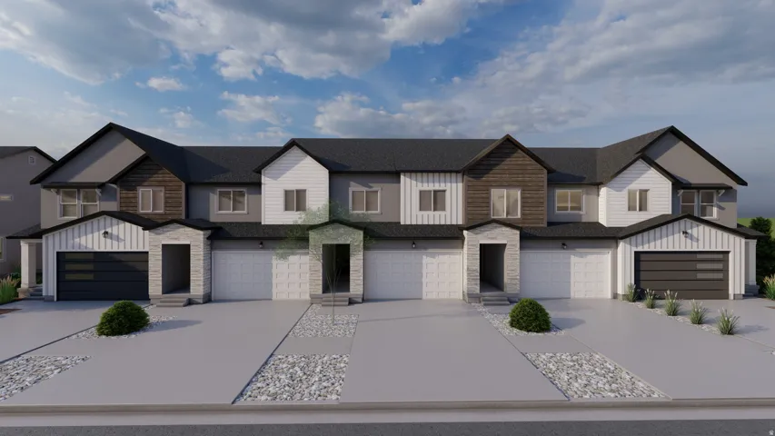 Modern townhome exteriors featuring varied siding, dark garage doors, stone accents, and pitched dark roofs
