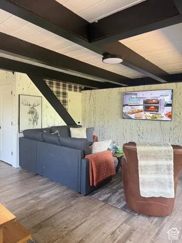 Exposed ceiling beams provide architectural interest