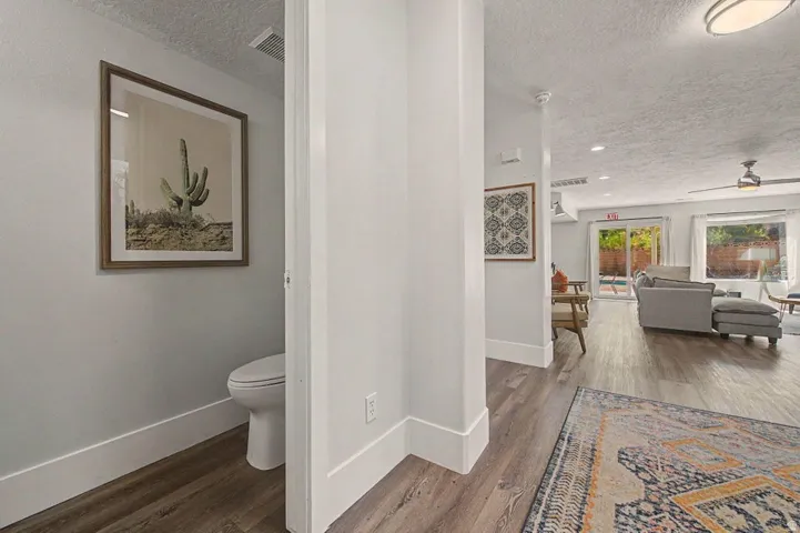 White walls with a tall baseboard trim throughout