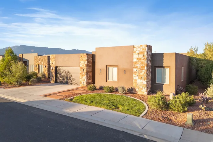 Stucco exterior with stacked stone accents