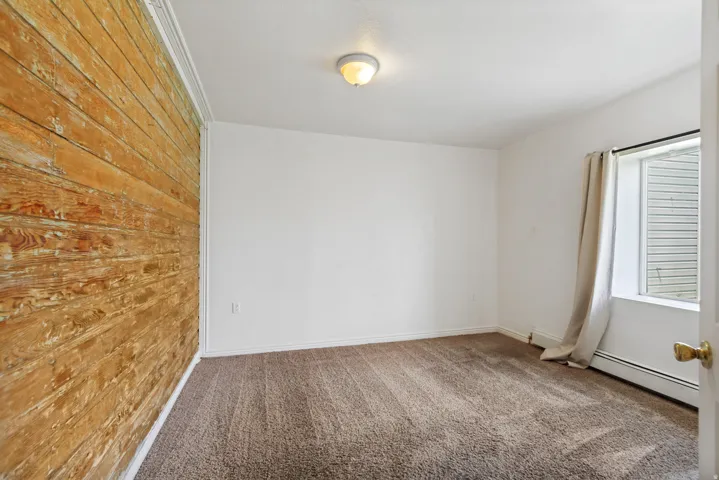 Accent wall featuring horizontal wood paneling